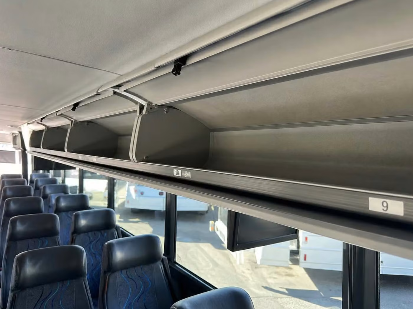 russellville 25 passenger minibus overhead storage