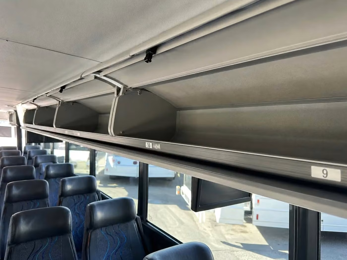 russellville 28 passenger minibus overhead storage