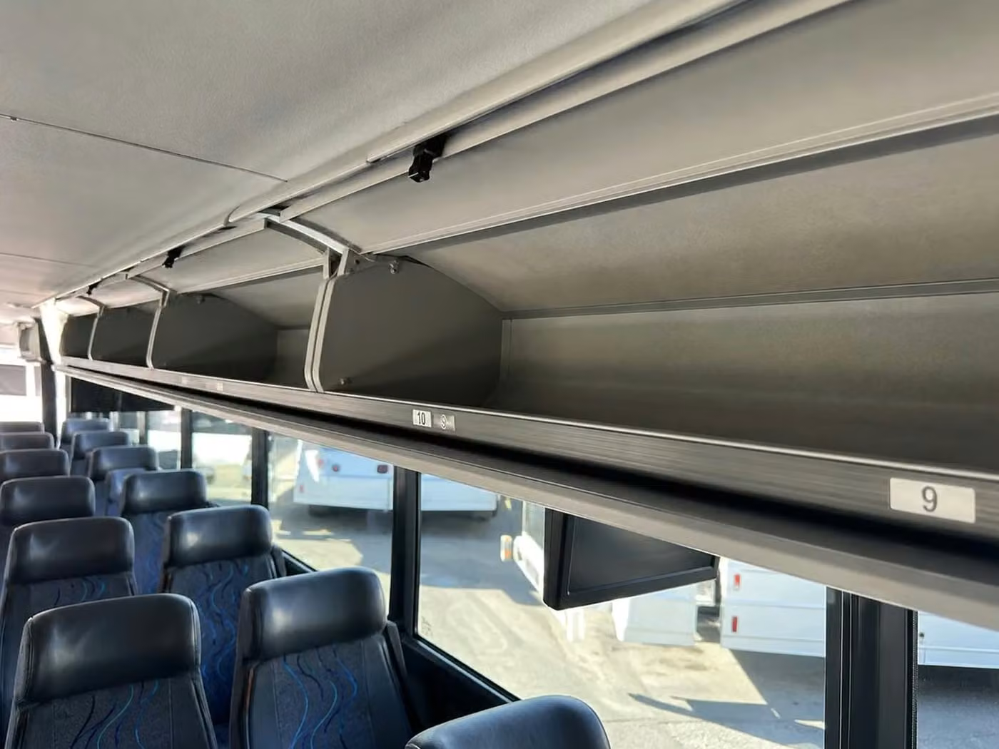 russellville 35 passenger minibus overhead storage
