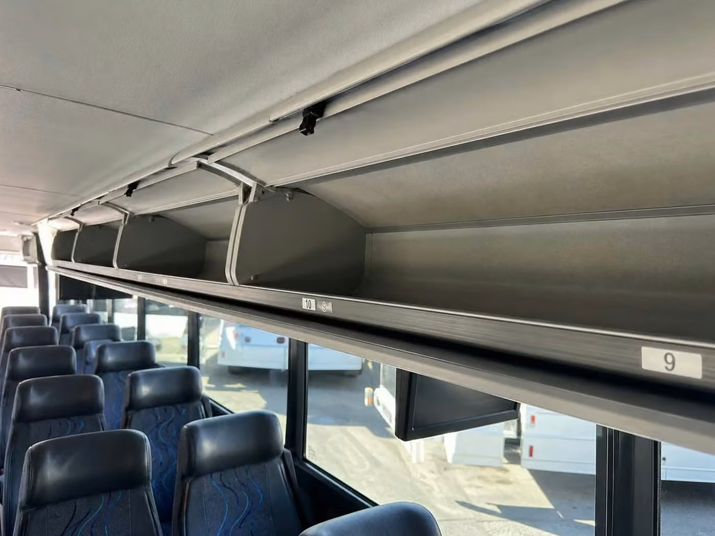 russellville 56 passenger charter bus overhead storage