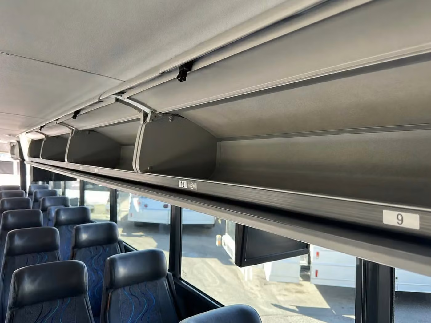 russellville charter bus overhead storage
